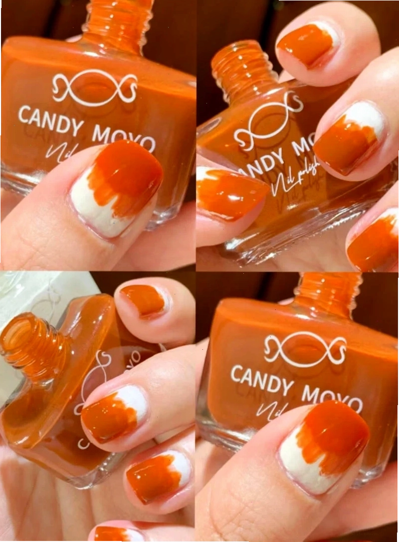 Da đen vẫn có thể sơn móng tay màu cam đẹp