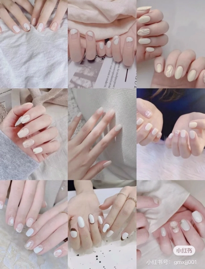 Mẫu nail tay trắng với họa tiết hoa nhí mảnh mai